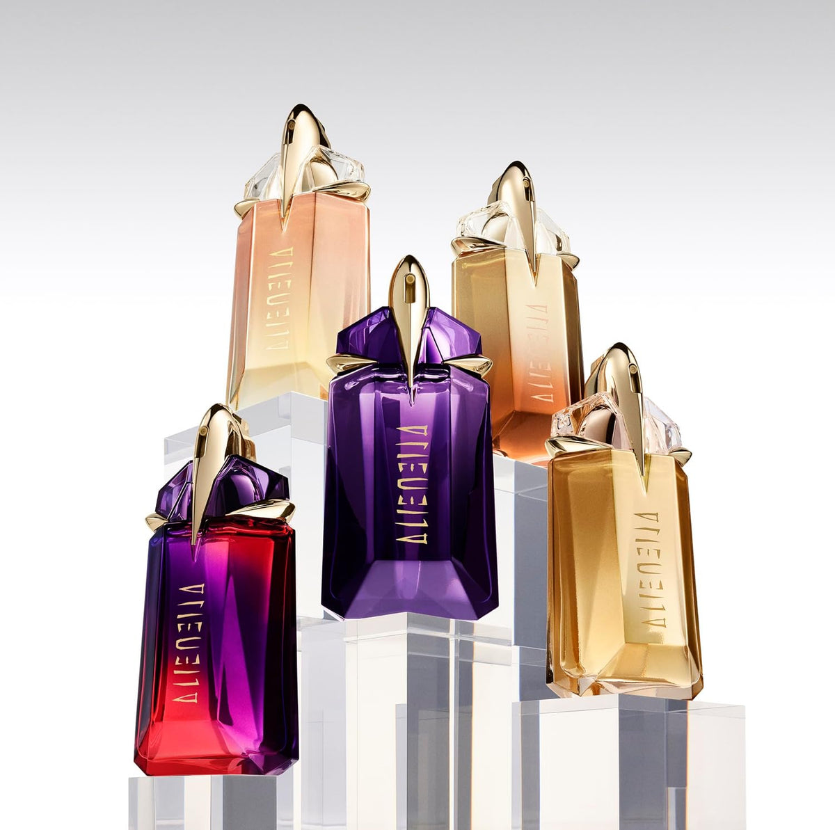 AuraLab Mugler Alien Eau De Parfum bottle featuring floral and woody notes, long-lasting women's perfume with elegant design.