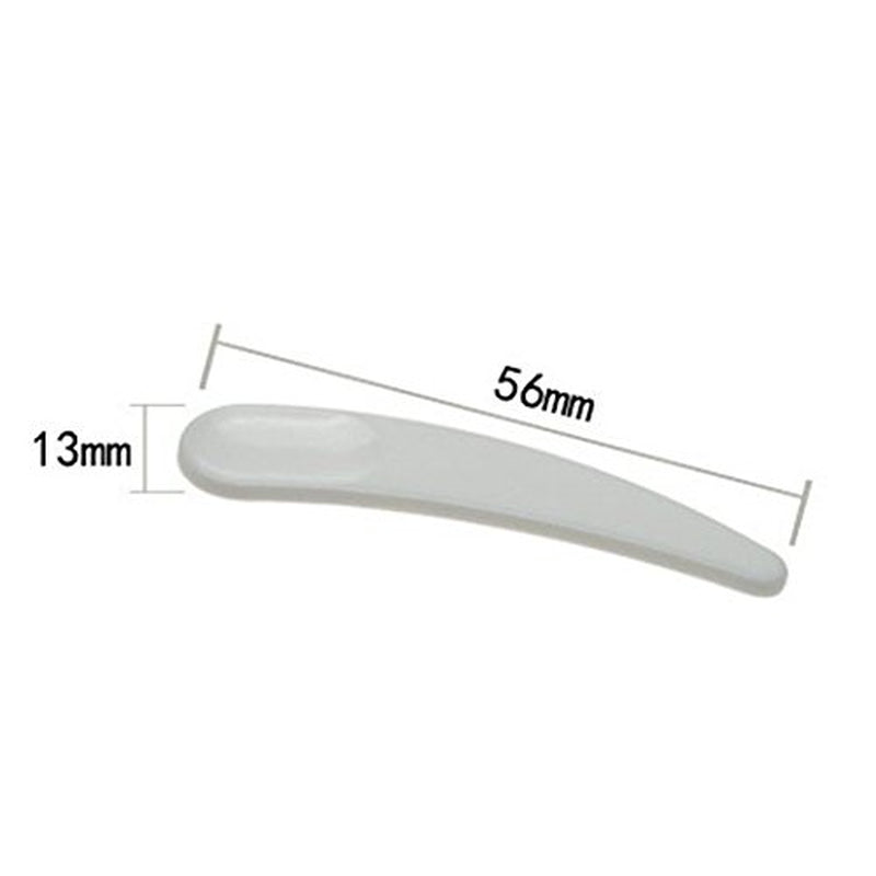 Set of 100 white mini curved plastic cosmetic spoons for makeup masks, ideal for precise application and skincare routines.