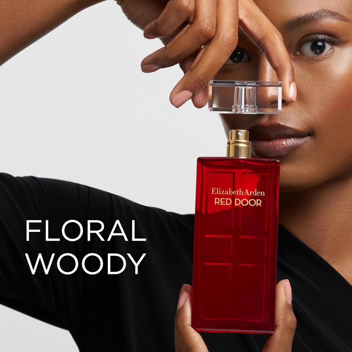 Elizabeth Arden Red Door Eau De Parfum bottle for women, 1.7 fl oz, with elegant packaging and floral fragrance imagery.