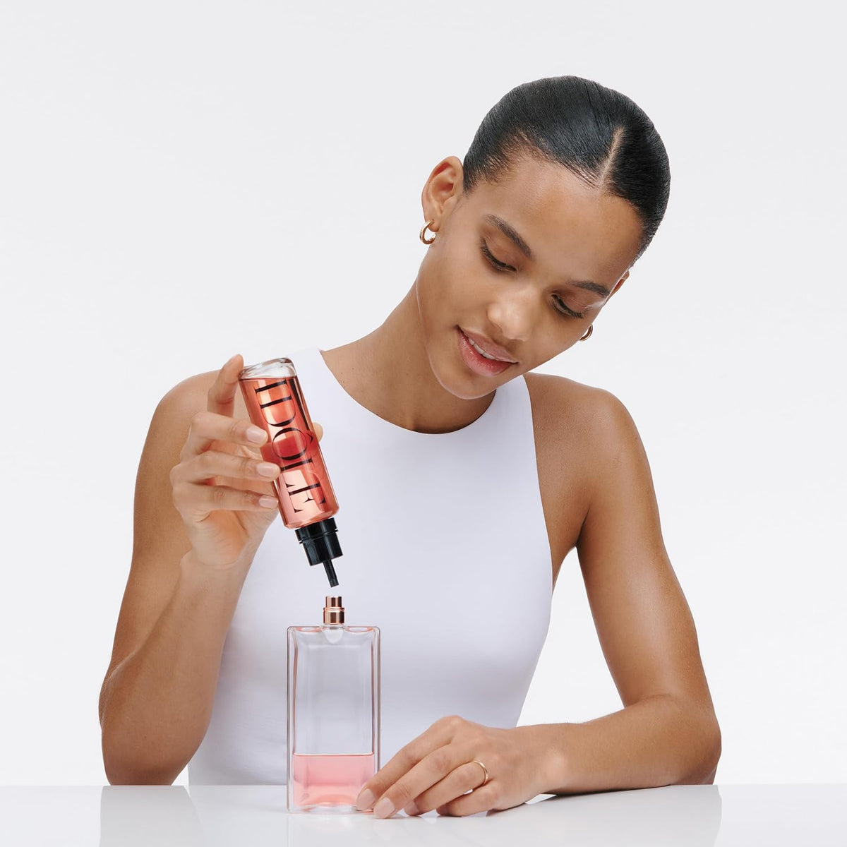 Lancôme Idôle Eau de Parfum bottle, fresh and floral women's perfume in 3.4 fl oz bottle, with elegant design and floral accents.