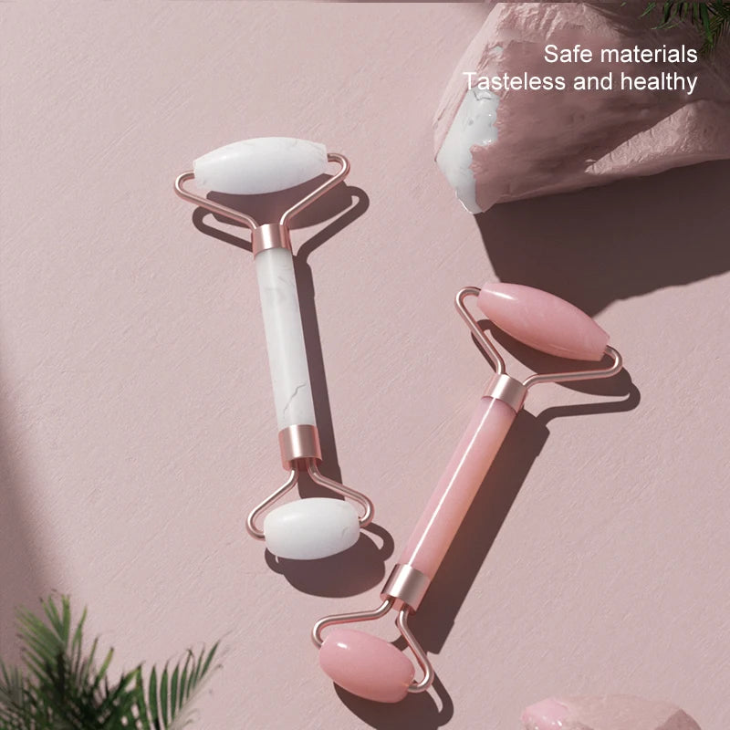 AuraLab dual size facial massage kit with heart-shaped Gua Sha board and double-end roller for skin lifting and puffiness reduction.
