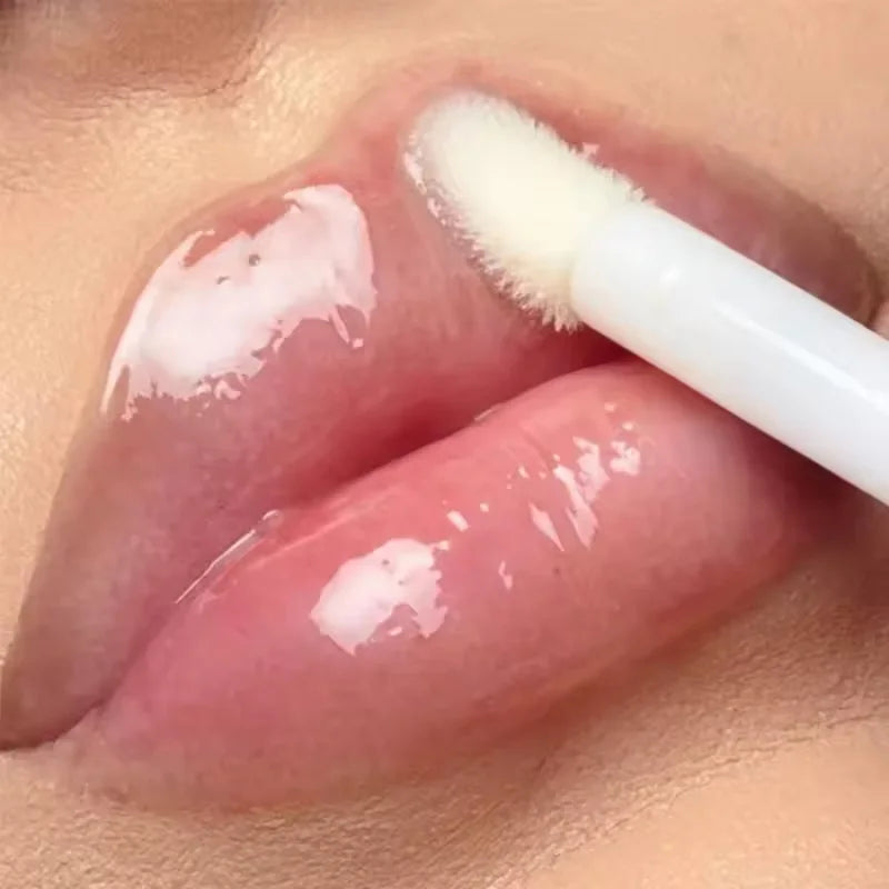 AuraLab volumising lip plumper serum with glossy finish, enhancing lip elasticity, reducing fine lines, and moisturizing for a bright, sexy look.